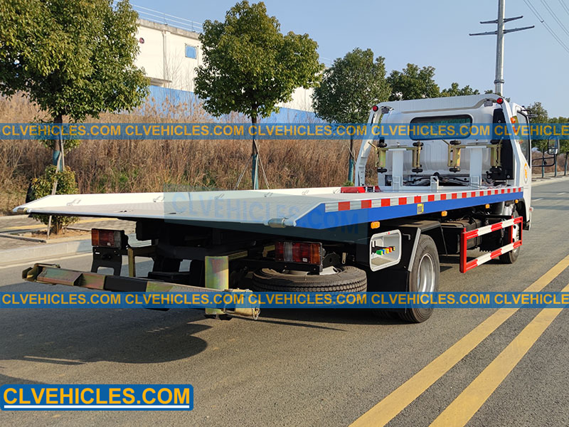 Flatbed wrecker tow truck